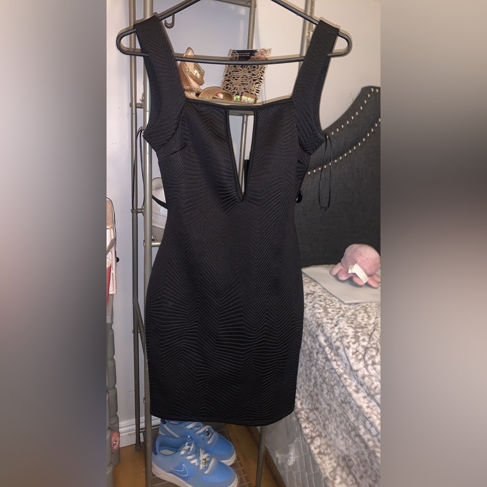 Women’s black open back dress. Size medium